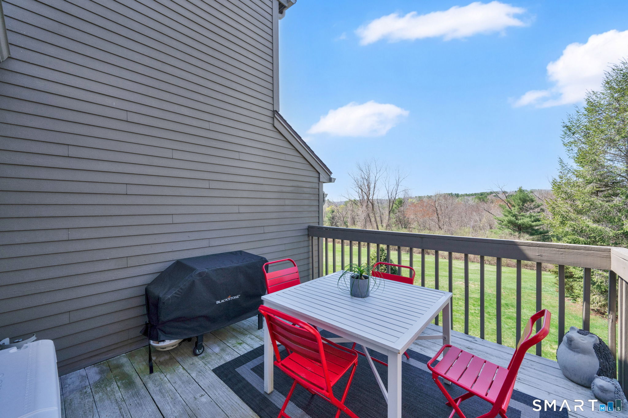 10 Depot Road, Unit 22 Willington, CT 06279 - Photo 28 of 36 a view of a balcony with furniture