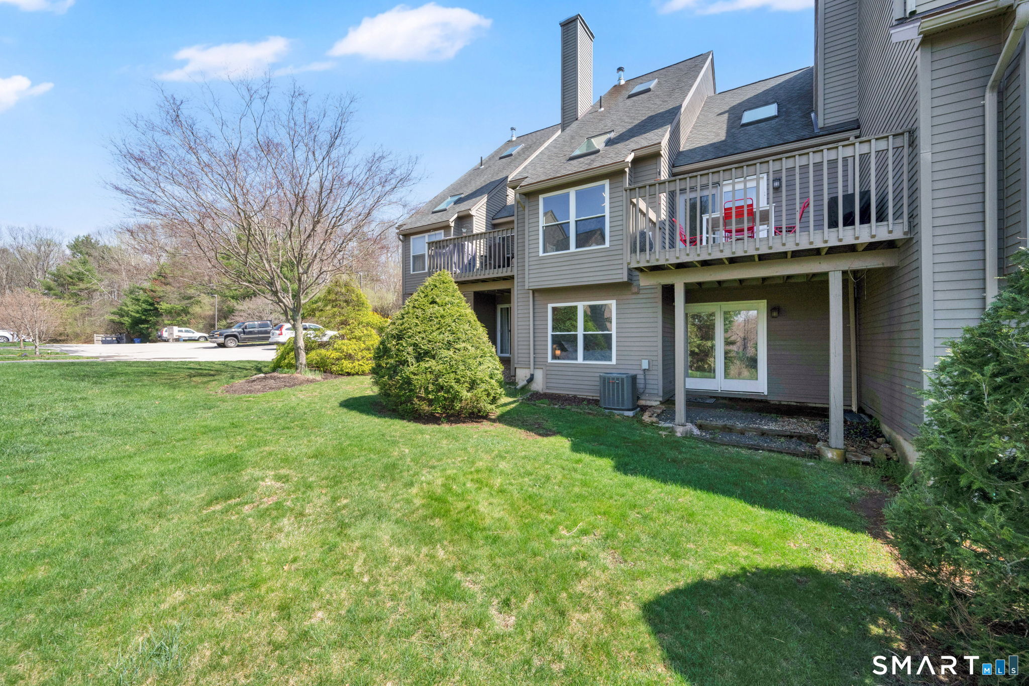 10 Depot Road, Unit 22 Willington, CT 06279 - Photo 30 of 36 a view of a house with backyard and sitting area