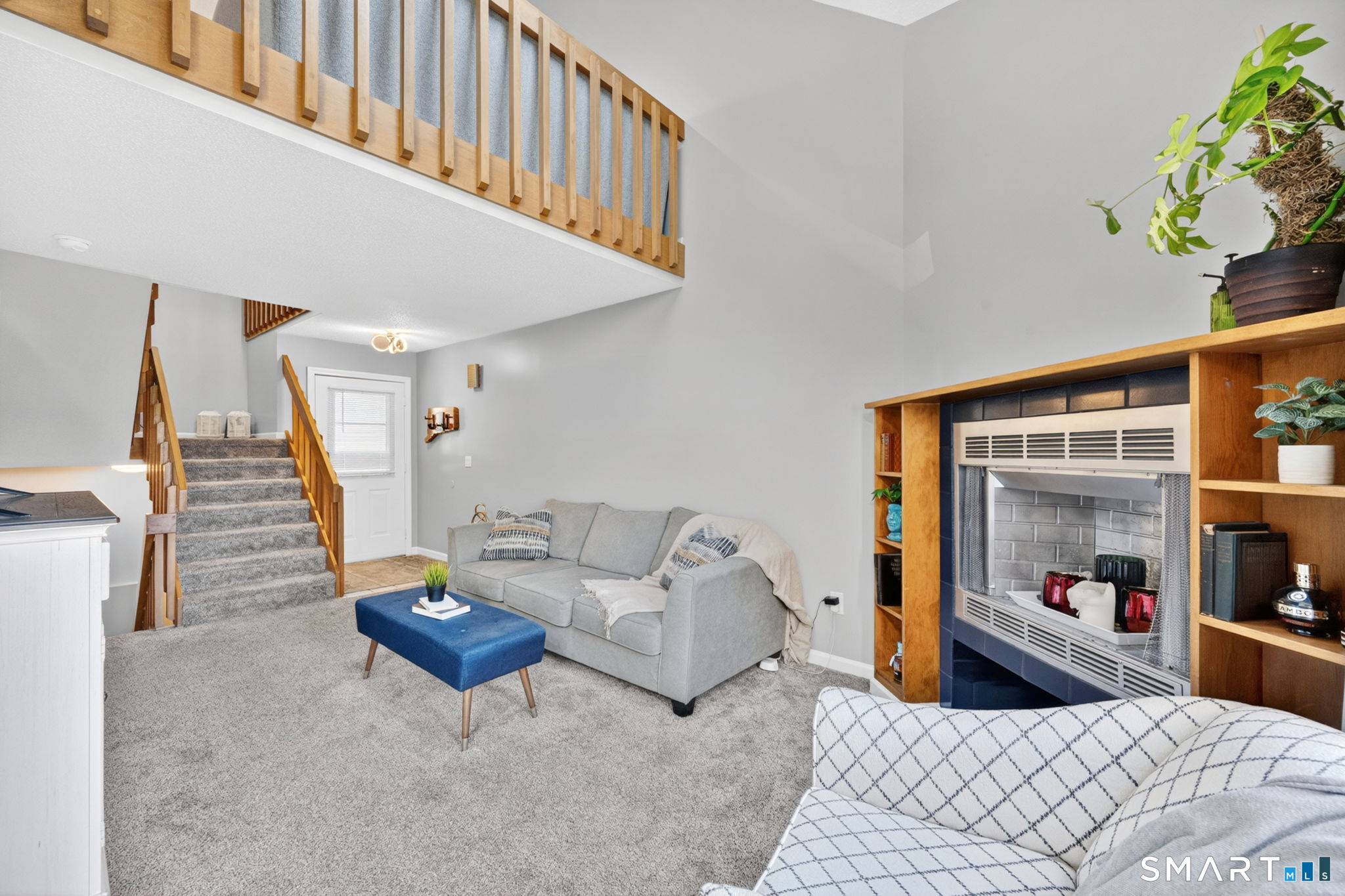 10 Depot Road, Unit 22 Willington, CT 06279 - Photo 5 of 36 a bedroom with furniture and a book shelf