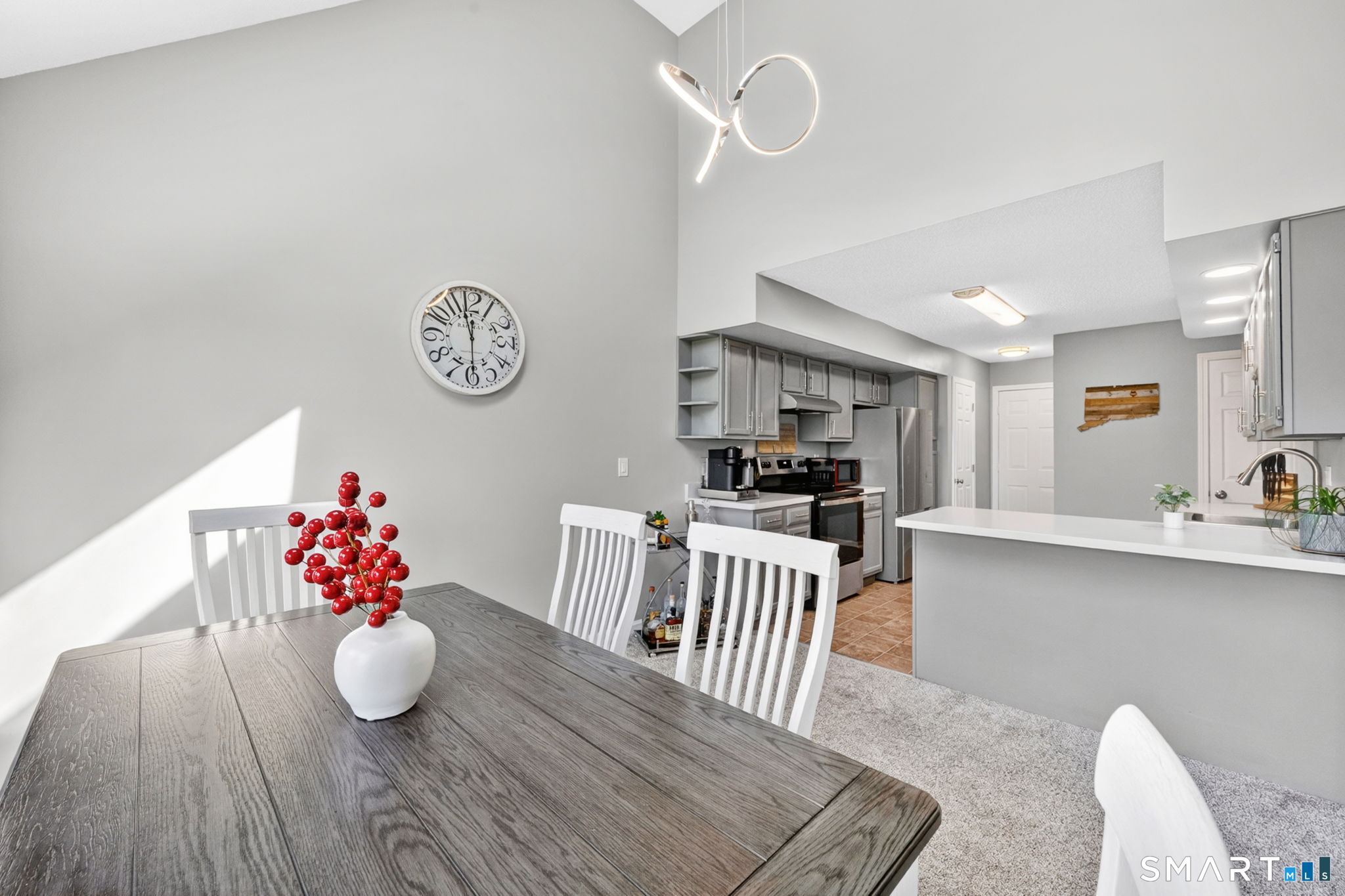 10 Depot Road, Unit 22 Willington, CT 06279 - Photo 7 of 36 a kitchen with a table and chairs
