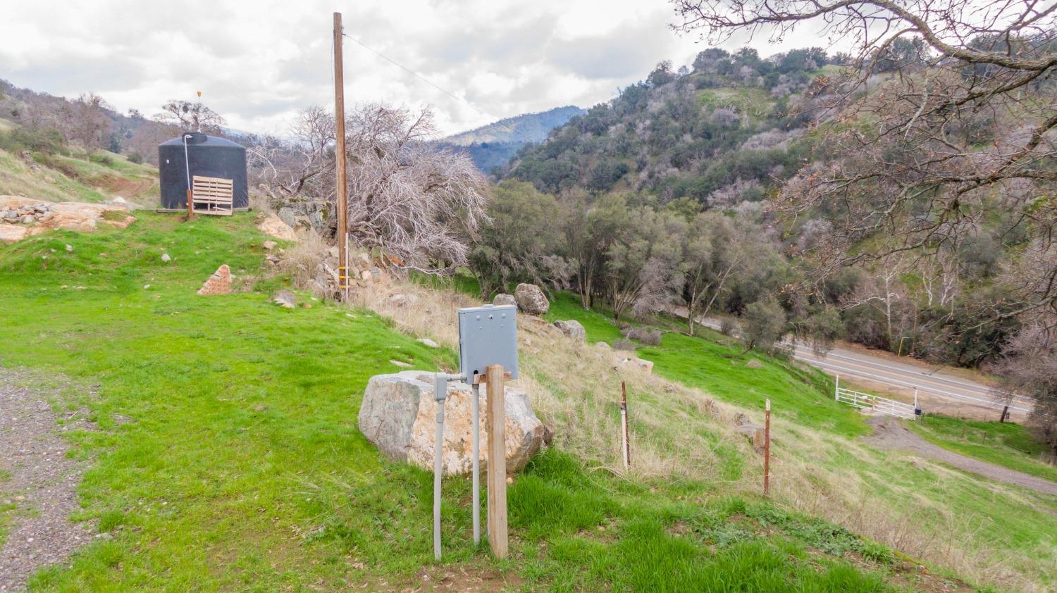 33220 East Kings Canyon Road Squaw Valley, CA 93675 - Photo 15 of 23 a garden view with a fountain