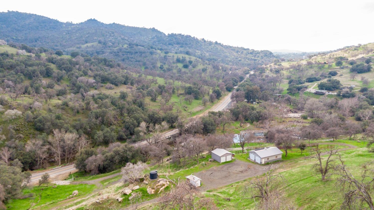33220 East Kings Canyon Road Squaw Valley, CA 93675 - Photo 5 of 23 an aerial view of a house with a yard