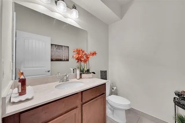 a living room with furniture and flat screen tv