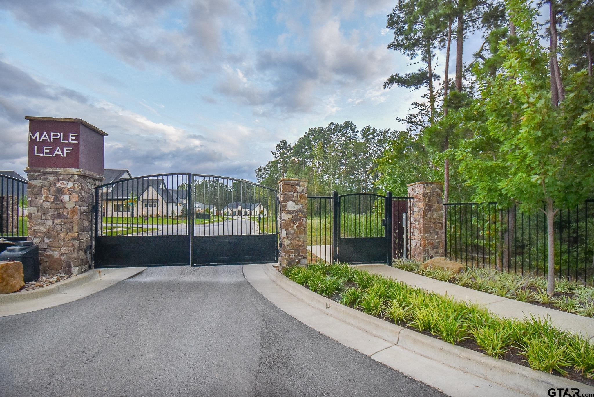 7933 Maple Lane Tyler, TX 75703 - Photo 2 of 10 a view of a garden