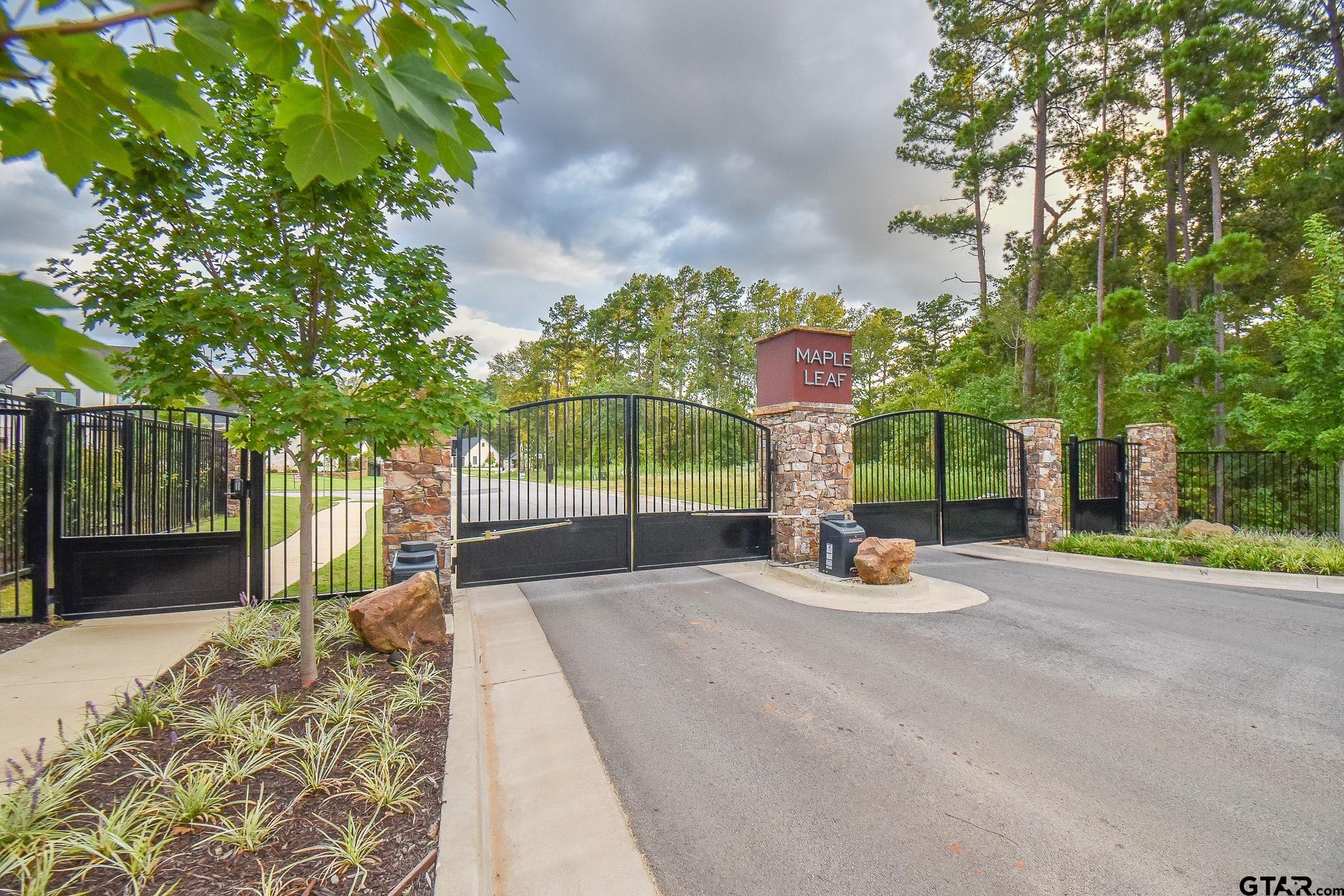 7933 Maple Lane Tyler, TX 75703 - Photo 4 of 10 a garden view with a seating space