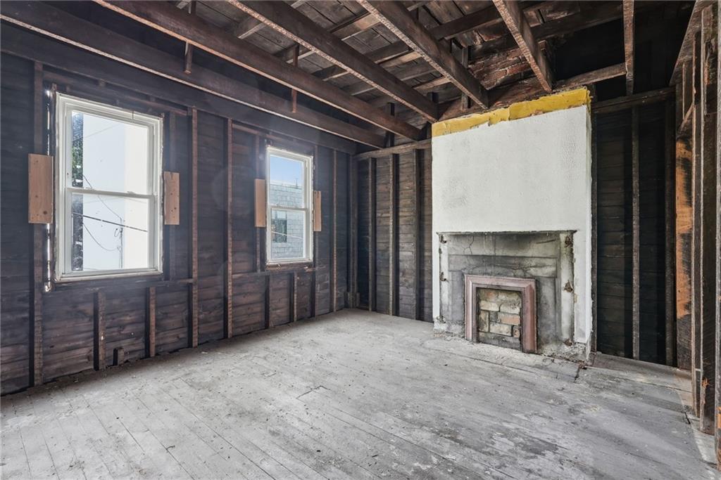 5405 Kent Way Pittsburgh, PA 15201 - Photo 8 of 24 a view of an empty room with a fireplace and a window