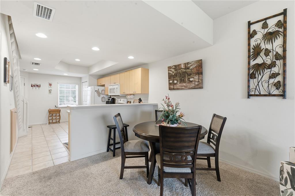 1246 Rio De Janeiro Avenue, Unit 503 Punta Gorda, FL 33983 - Photo 11 of 34 a view of a dining room with furniture