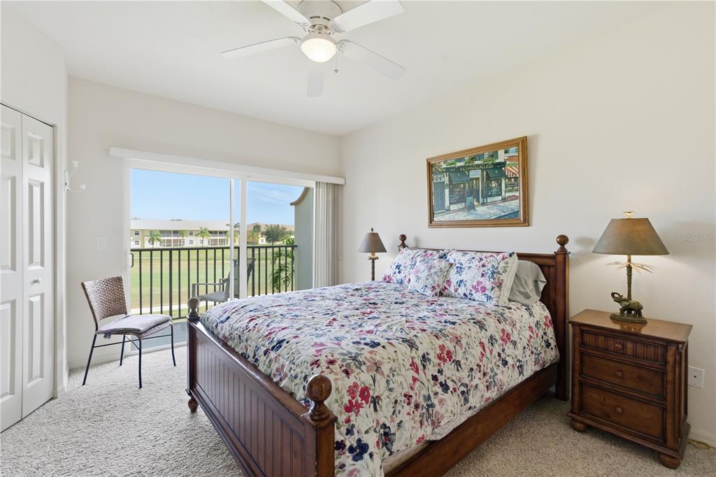 1246 Rio De Janeiro Avenue, Unit 503 Punta Gorda, FL 33983 - Photo 13 of 34 a bedroom with a bed and a window