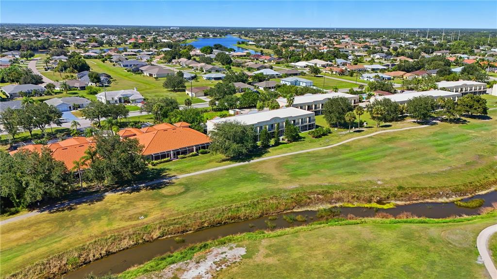 1246 Rio De Janeiro Avenue, Unit 503 Punta Gorda, FL 33983 - Photo 29 of 34 an aerial view of residential houses with outdoor space