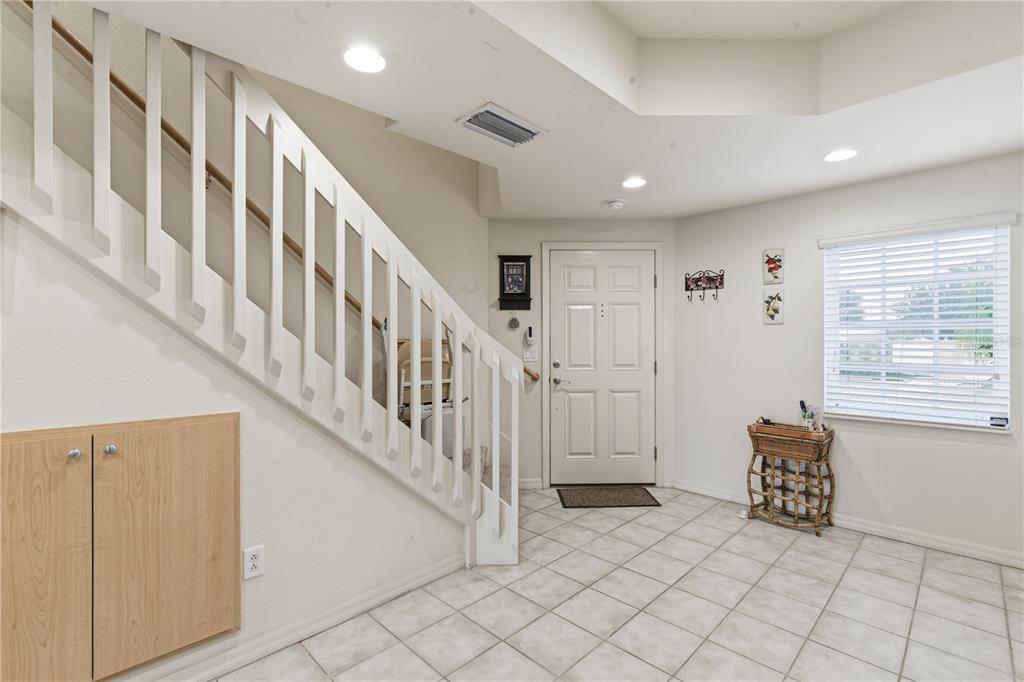 1246 Rio De Janeiro Avenue, Unit 503 Punta Gorda, FL 33983 - Photo 4 of 34 a view of an entryway with stairs
