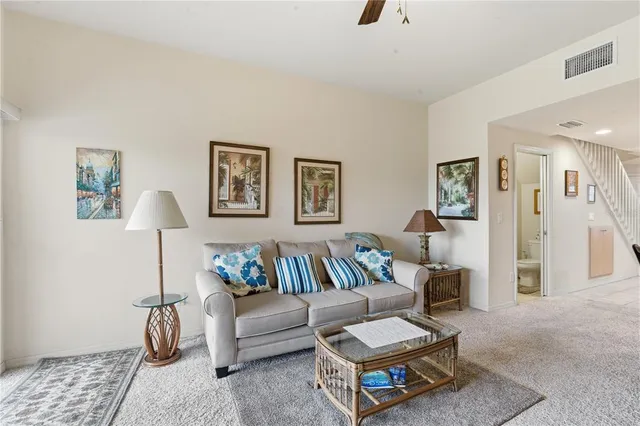 a living room with furniture and a couch