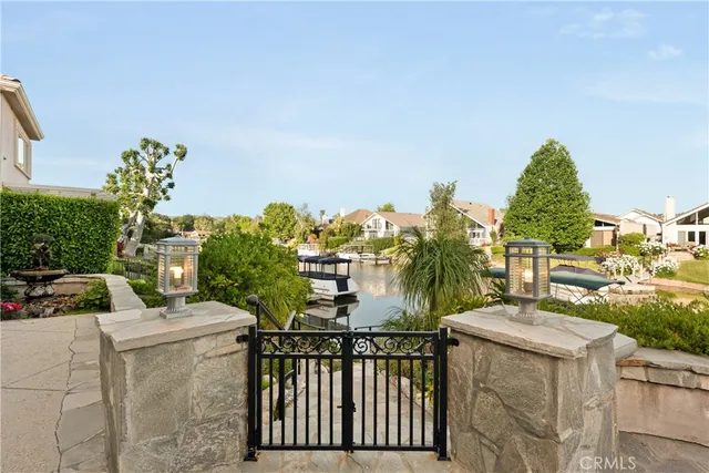 a bathroom with a granite countertop sink a large mirror and shower