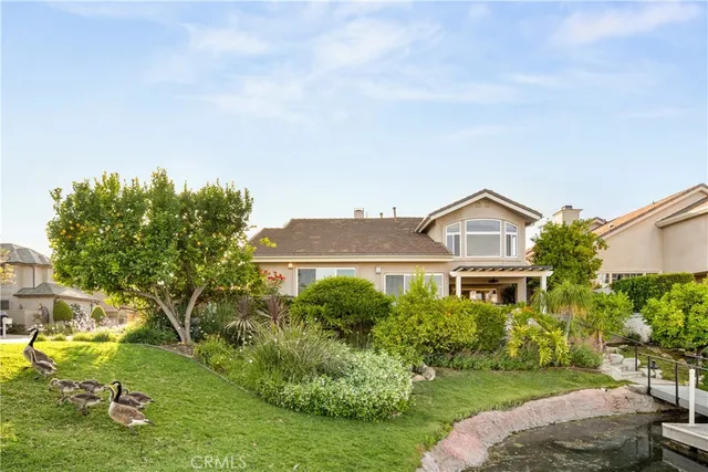 a bedroom with a bed and a table