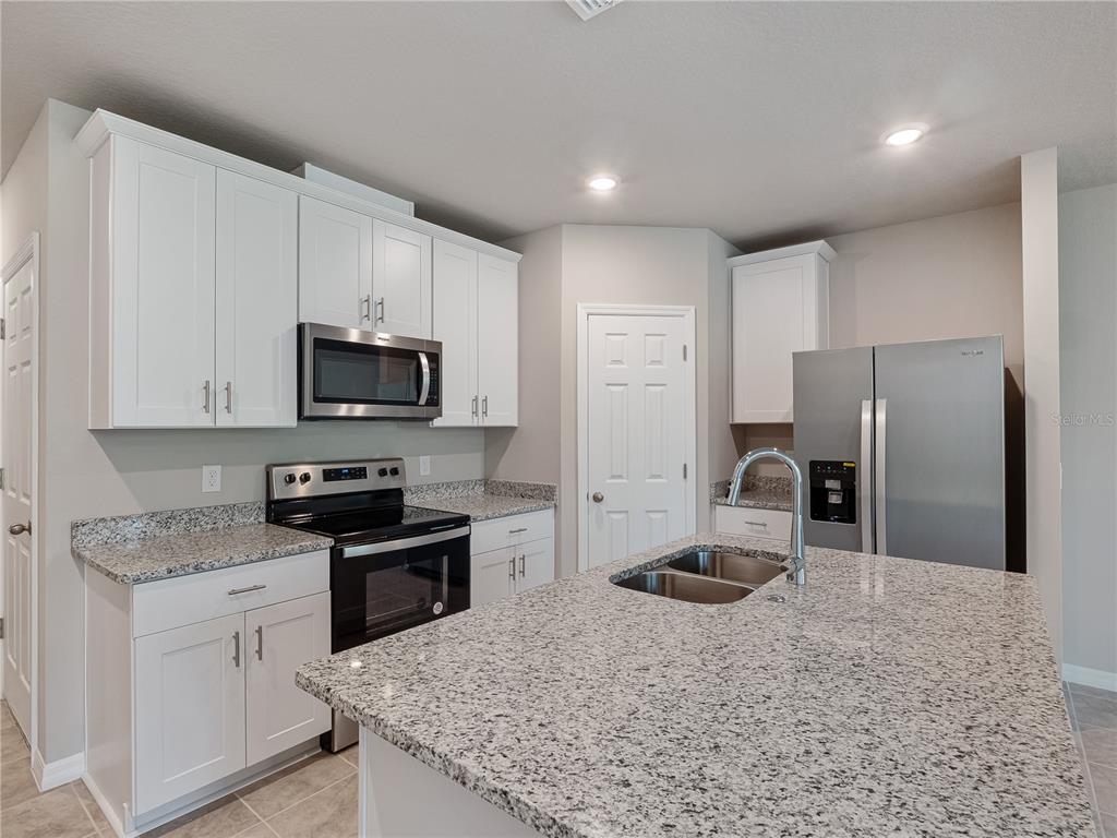 658 Legacy Loop Davenport, FL 33896 - Photo 7 of 26