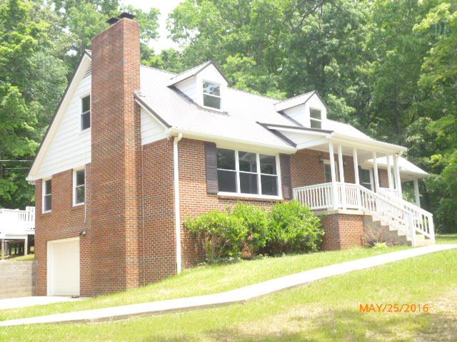 450 West Piney Road Dickson, TN 37055 - Photo 1 of 29 a view of a house with a yard and sitting space