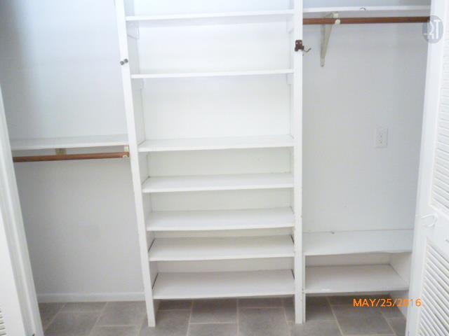 450 West Piney Road Dickson, TN 37055 - Photo 13 of 29 a view of walk in closet with empty racks