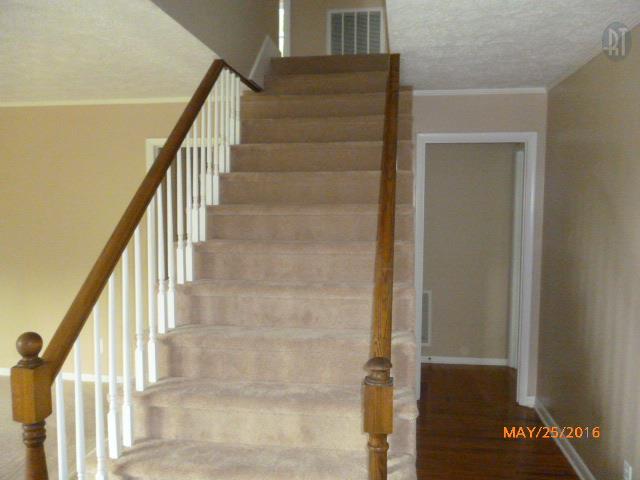 450 West Piney Road Dickson, TN 37055 - Photo 18 of 29 a view of staircase with white walls and a next to a window