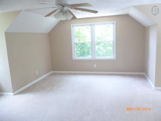 450 West Piney Road Dickson, TN 37055 - Photo 20 of 29 an empty room with a window and a fan