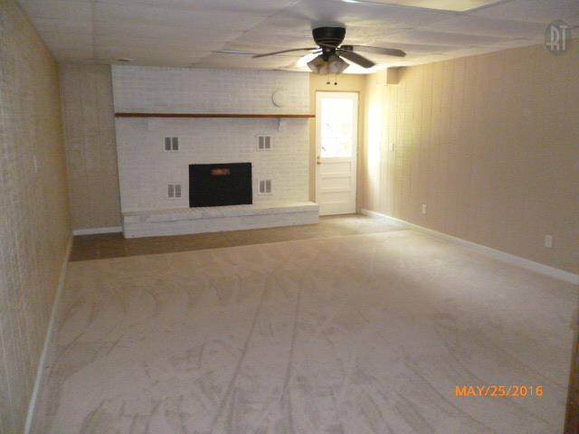 450 West Piney Road Dickson, TN 37055 - Photo 21 of 29 a view of a livingroom with a chandelier