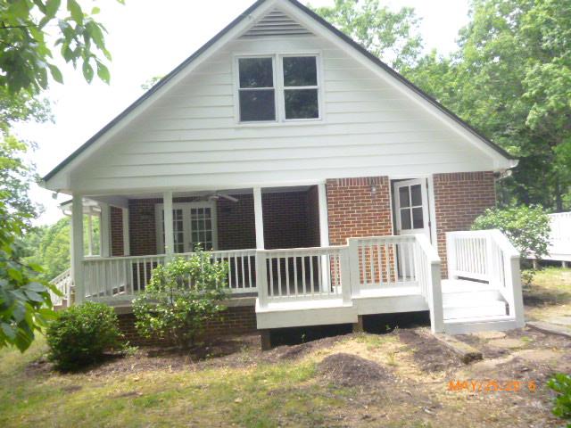 450 West Piney Road Dickson, TN 37055 - Photo 9 of 29 a view of a house with a yard