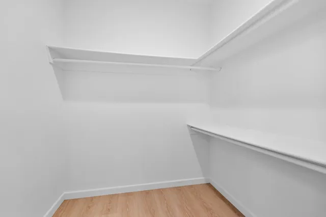 a view of small space with racks on the wall