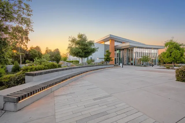 a view of a street with a building