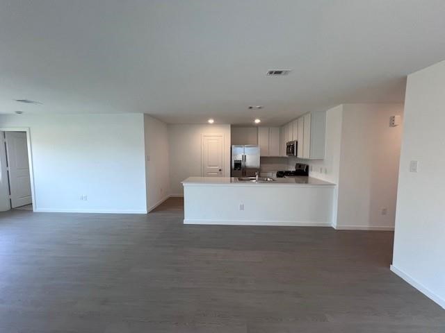 3049 Colusa Rdg Drive Katy, TX 77493 - Photo 5 of 44 a view of kitchen with kitchen island sink stainless steel appliances and cabinets