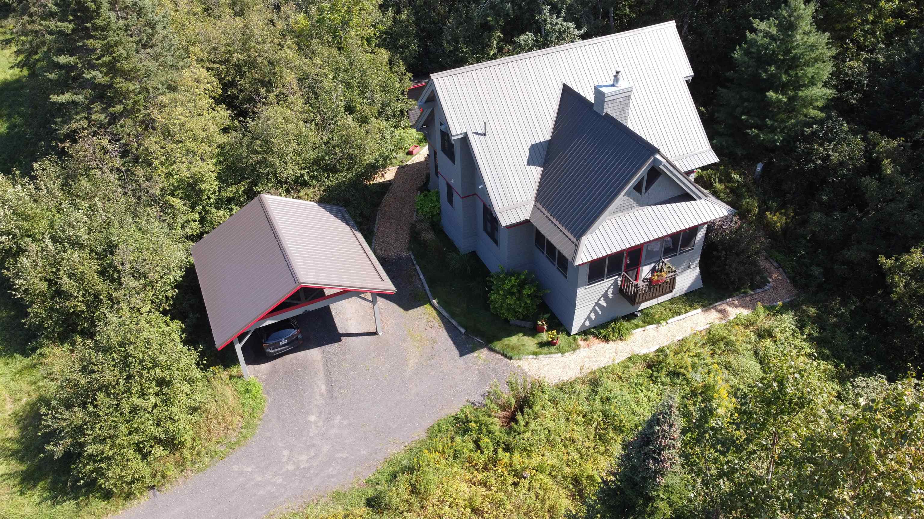 89095 Aster Road Cornucopia, WI 54827 - Photo 3 of 37 View from above of property with a forest