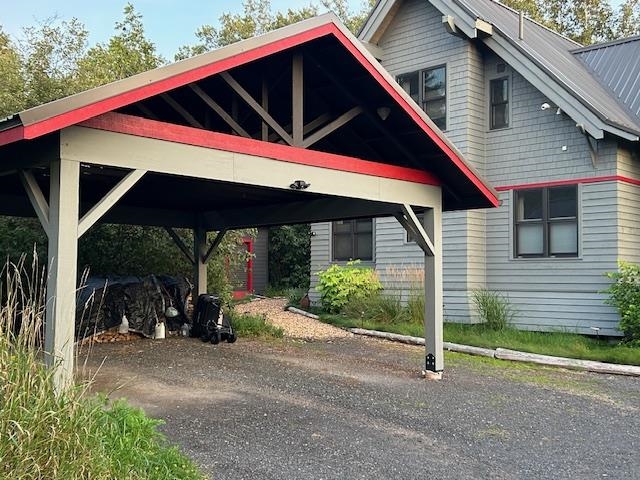 89095 Aster Road Cornucopia, WI 54827 - Photo 4 of 37 View of vehicle parking featuring a carport