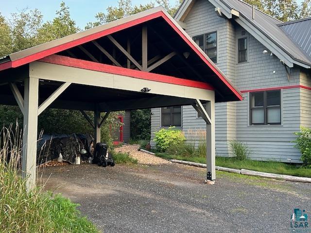 89095 Aster Road Cornucopia, WI 54827 - Photo 4 of 37 View of vehicle parking featuring a carport