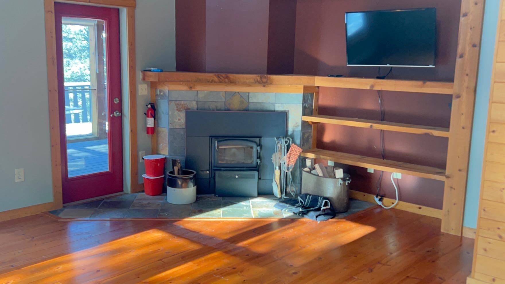 89095 Aster Road Cornucopia, WI 54827 - Photo 6 of 37 Efficient wood-burning fireplace