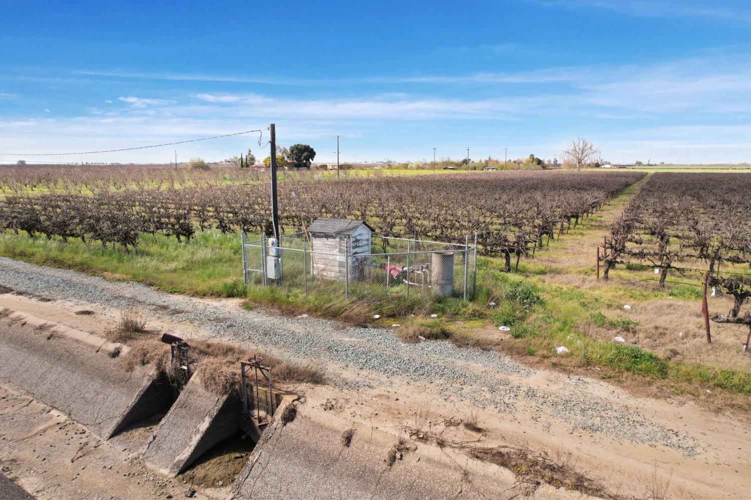4923 West Acampo Road Lodi, CA 95242 - Photo 11 of 17 a view of a road with a yard