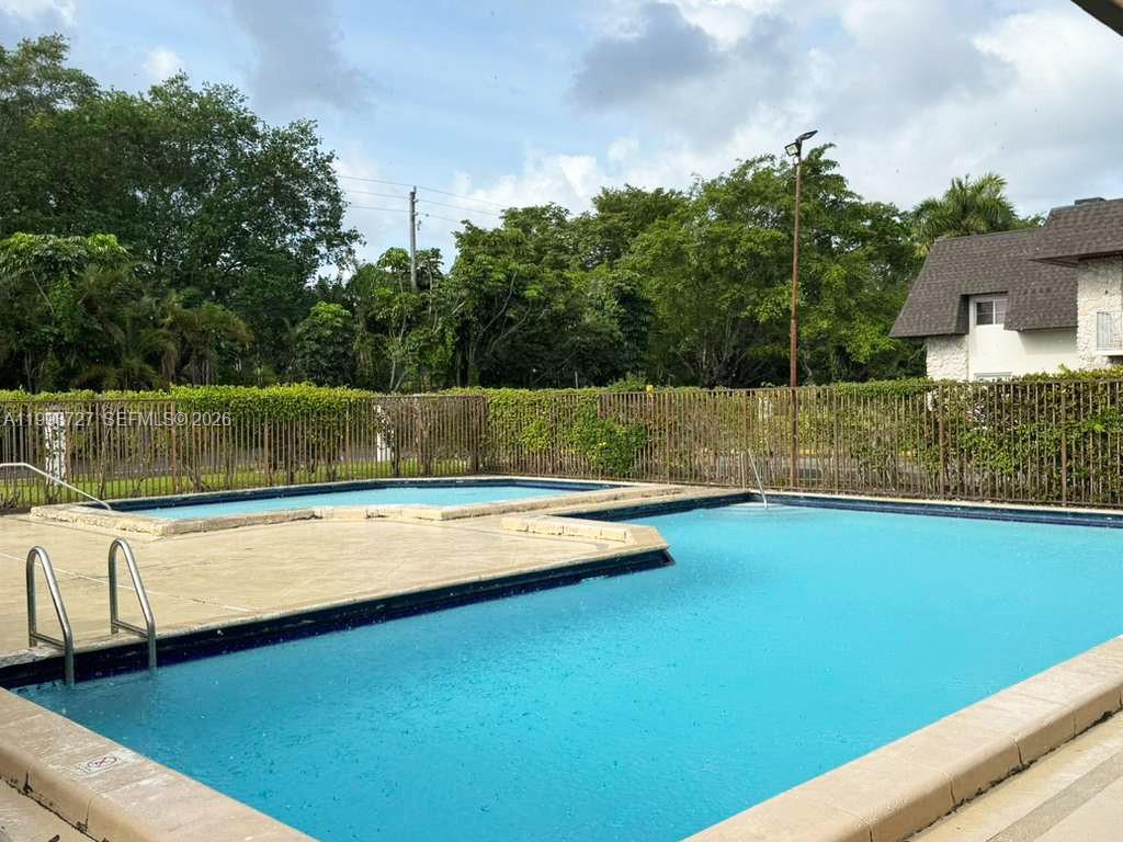 8475 Southwest 94th Street, Unit 119E Miami, FL 33156 - Photo 15 of 15 a view of a yard
