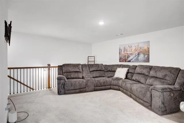 a living room with furniture and a couch