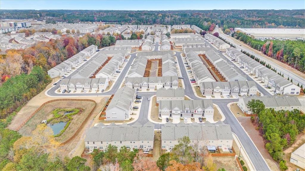 7788 Baron Road Fairburn, GA 30213 - Photo 17 of 17 an aerial view of a house with a yard