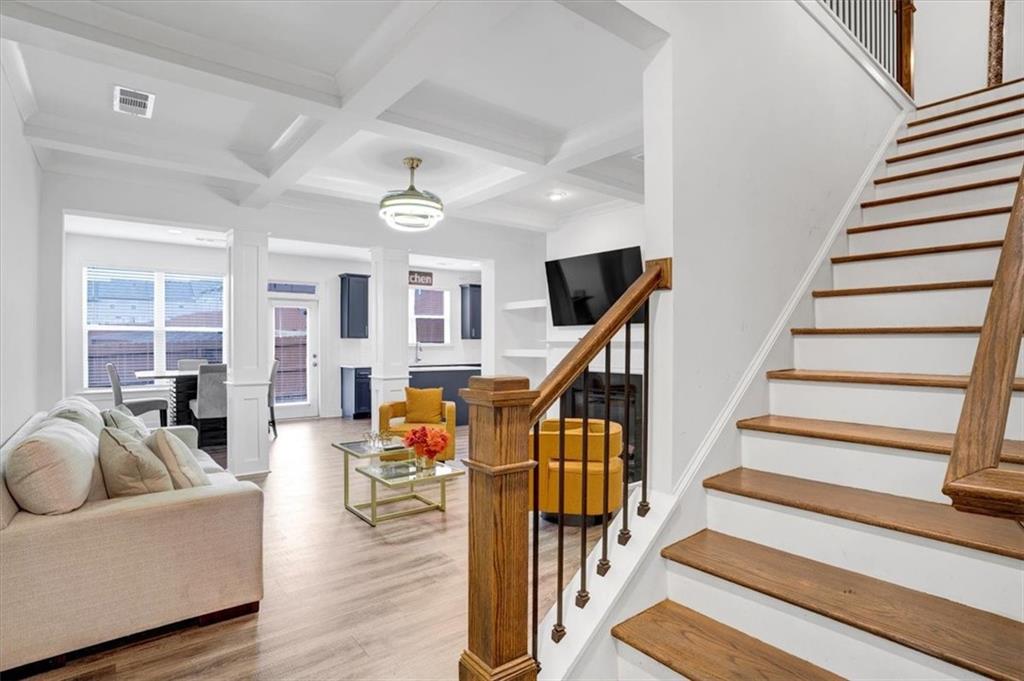 7788 Baron Road Fairburn, GA 30213 - Photo 3 of 17 a living room with furniture and wooden floor