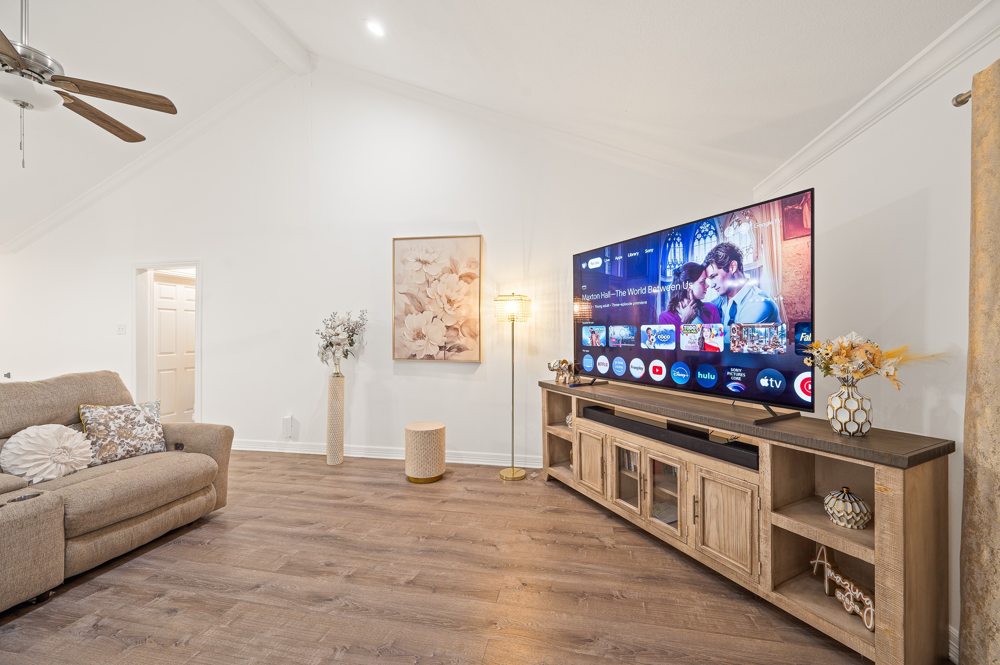 3823 Shadow Trail Houston, TX 77084 - Photo 17 of 29 a living room with furniture and a flat screen tv