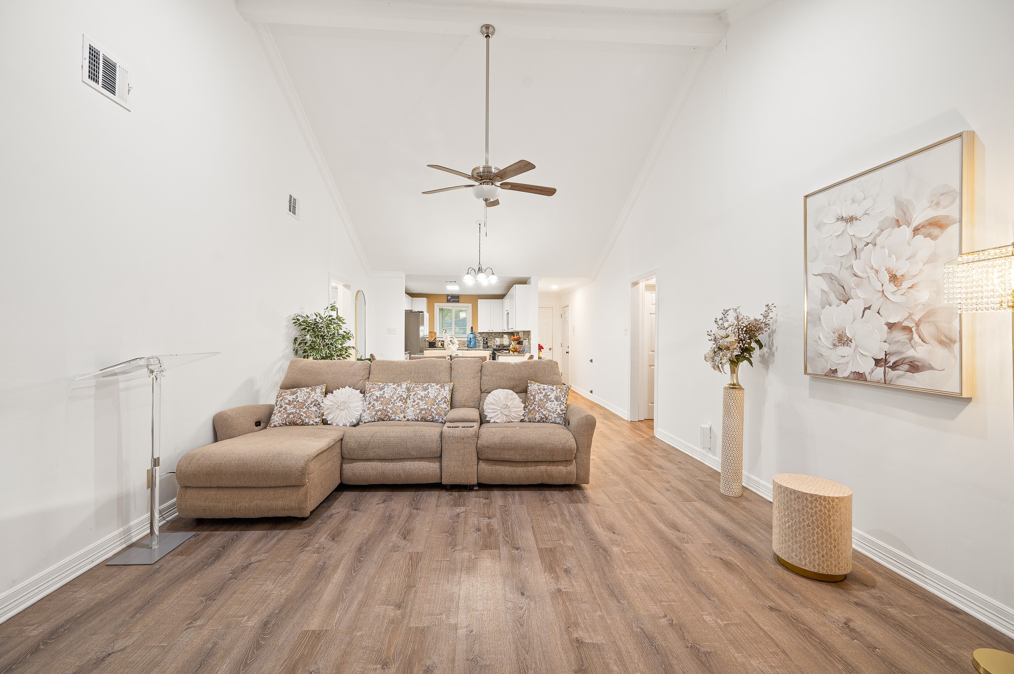 3823 Shadow Trail Houston, TX 77084 - Photo 18 of 29 a living room with furniture and a chandelier