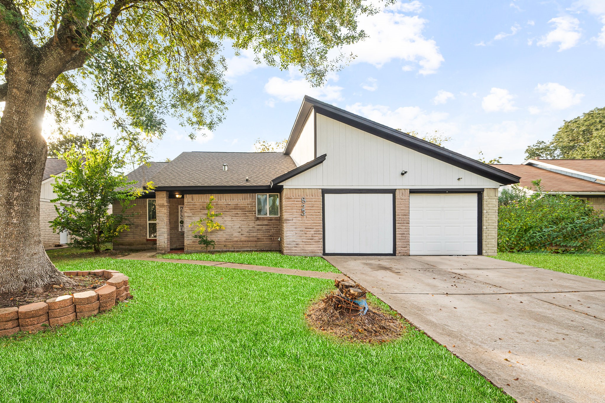 3823 Shadow Trail Houston, TX 77084 - Photo 2 of 29 a view of a house with a yard and sitting area
