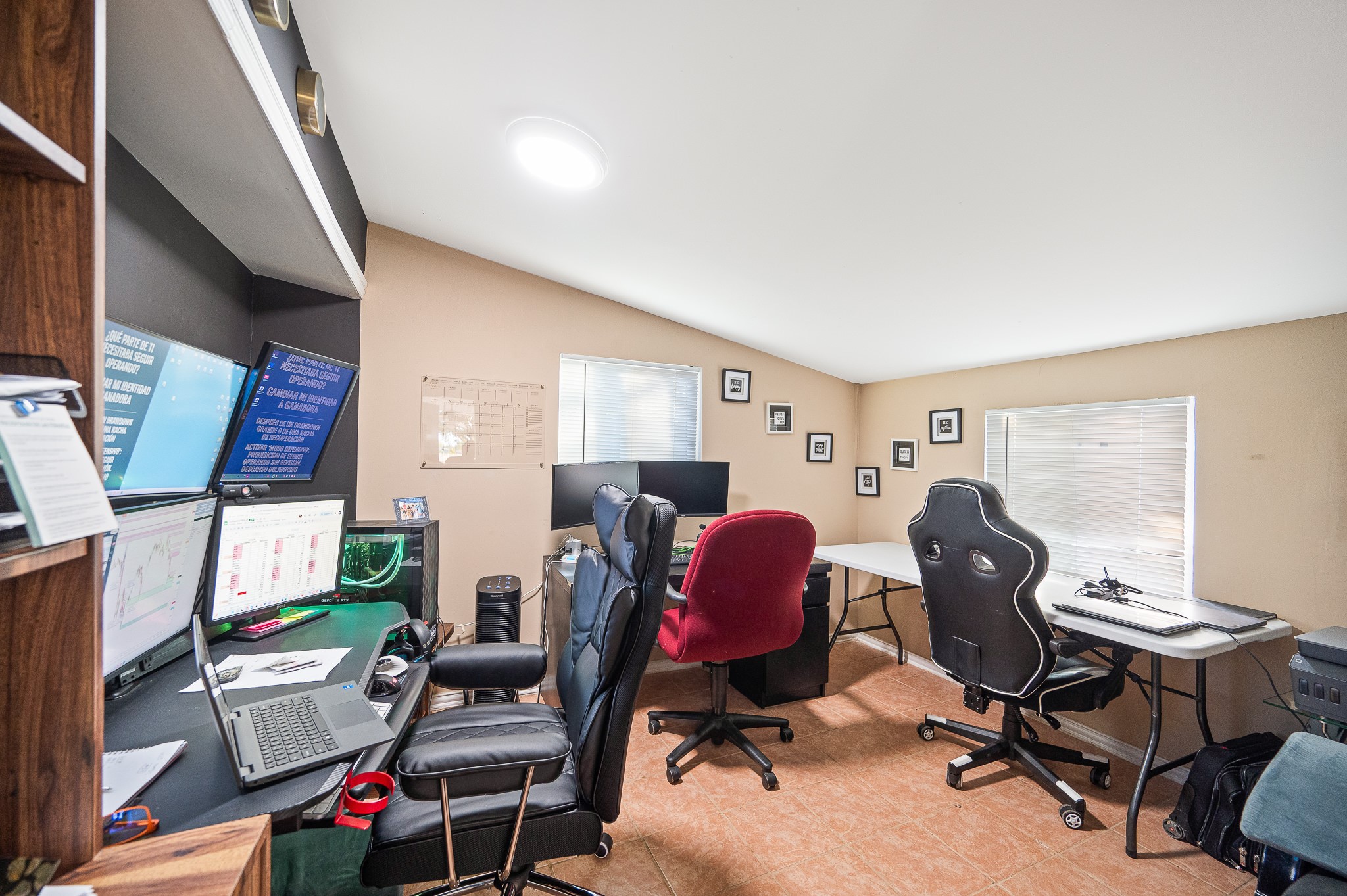 3823 Shadow Trail Houston, TX 77084 - Photo 24 of 29 a view of a workspace with furniture and a window