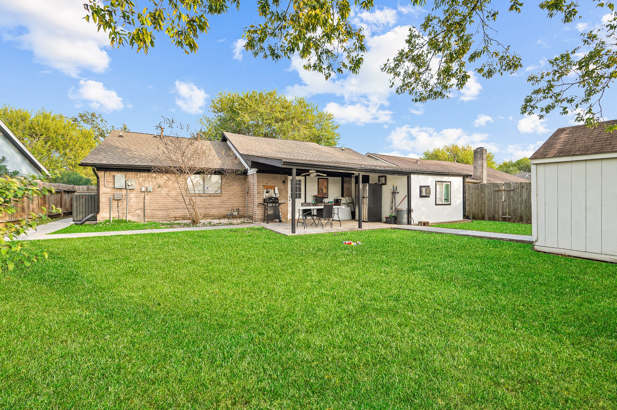 3823 Shadow Trail Houston, TX 77084 - Photo 28 of 29 a view of house that has a yard