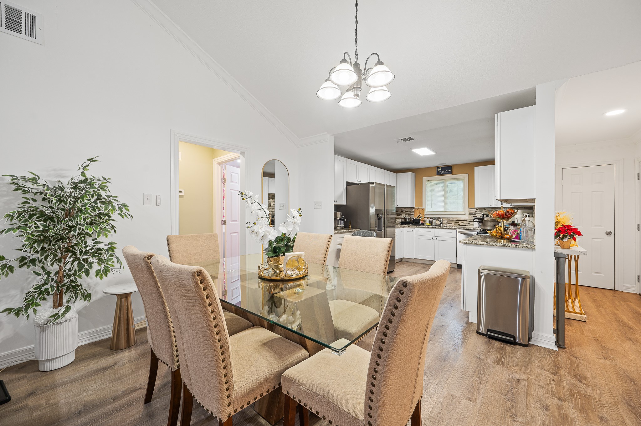 3823 Shadow Trail Houston, TX 77084 - Photo 7 of 29 a view of kitchen with cabinets table and chairs