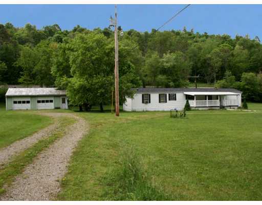 849 Shrokman Road Saltsburg, PA 15681 - Photo 1 of 10 Exterior Front. Well maintained 2 bedroom single wide with 2 car detached garage on 10 GORGEOUS acres, mostly cleared and level with trout stream bordering 2 sides. Gas Rights and FREE GAS to mobile. This one won t last!