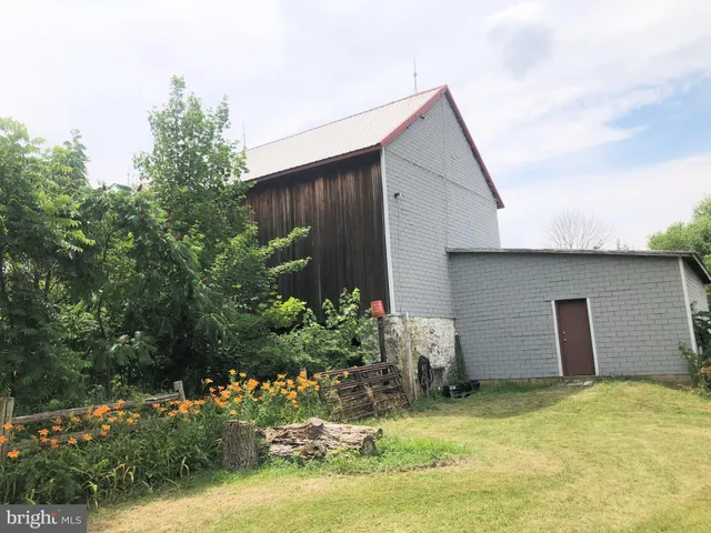 a view of an empty room with windows