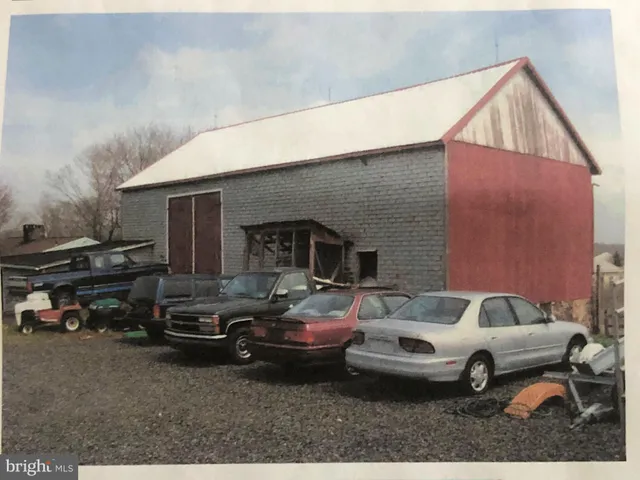 a kitchen with sink a stove and cabinets