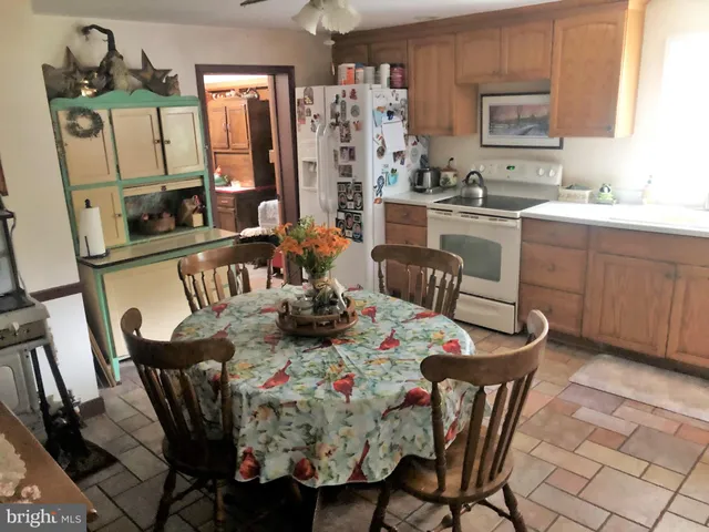 a room with water heater and utility room