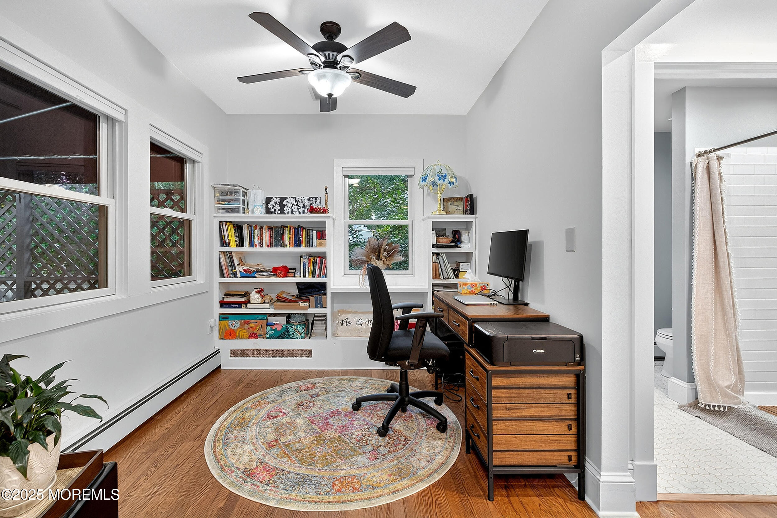 1961 Jumping Brook Road Tinton Falls, NJ 07753 - Photo 13 of 45 a view of a workspace with furniture and a potted plant