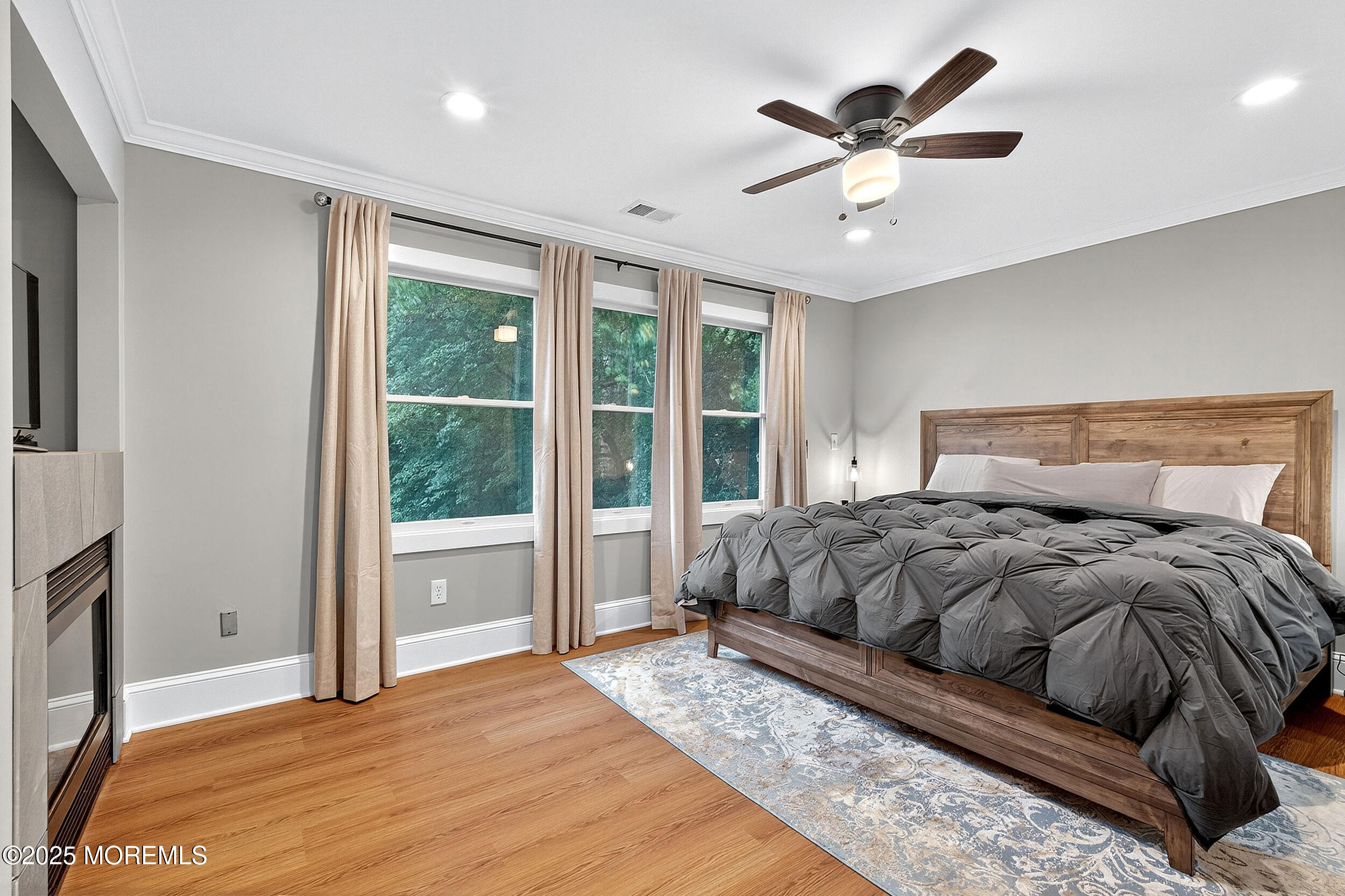 1961 Jumping Brook Road Tinton Falls, NJ 07753 - Photo 18 of 45 a bedroom with a large bed and a large window