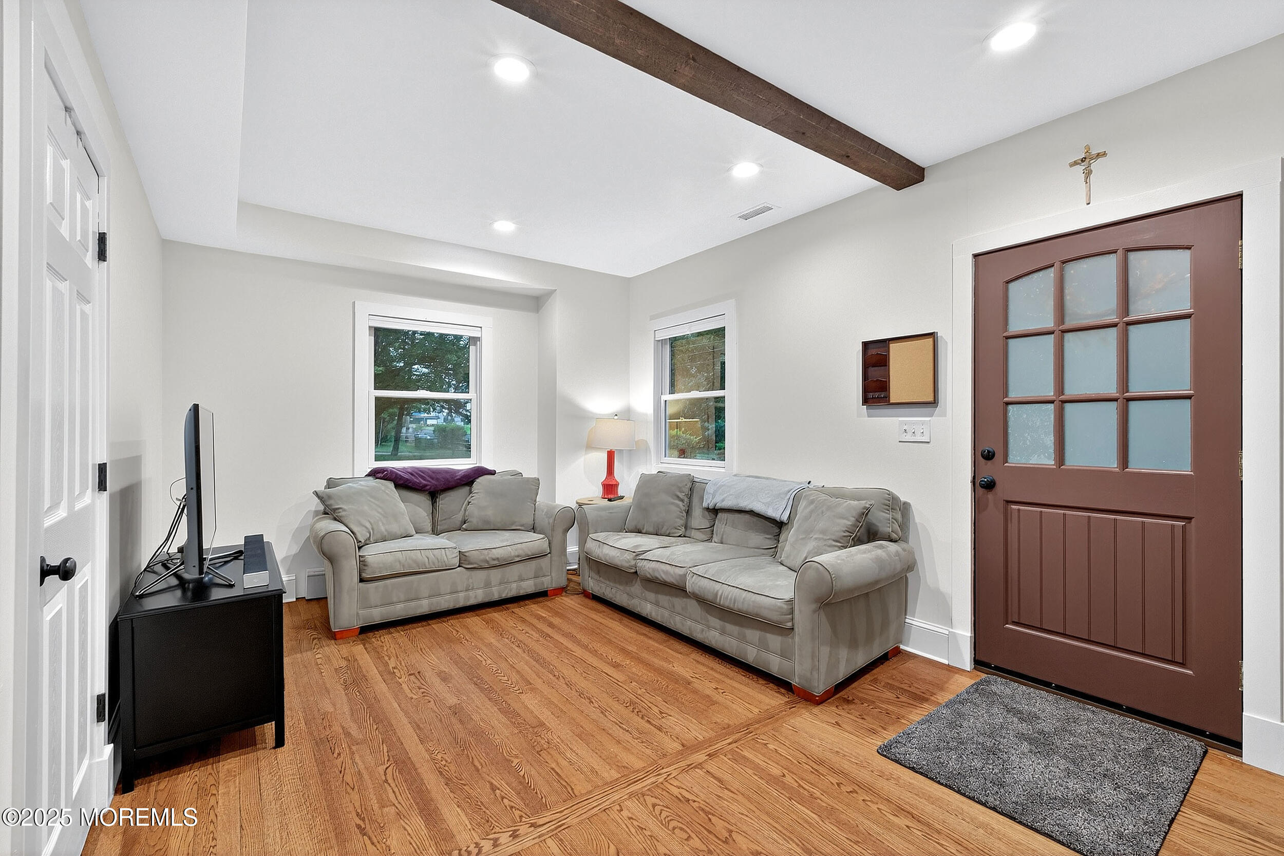 1961 Jumping Brook Road Tinton Falls, NJ 07753 - Photo 29 of 45 a living room with furniture and a window