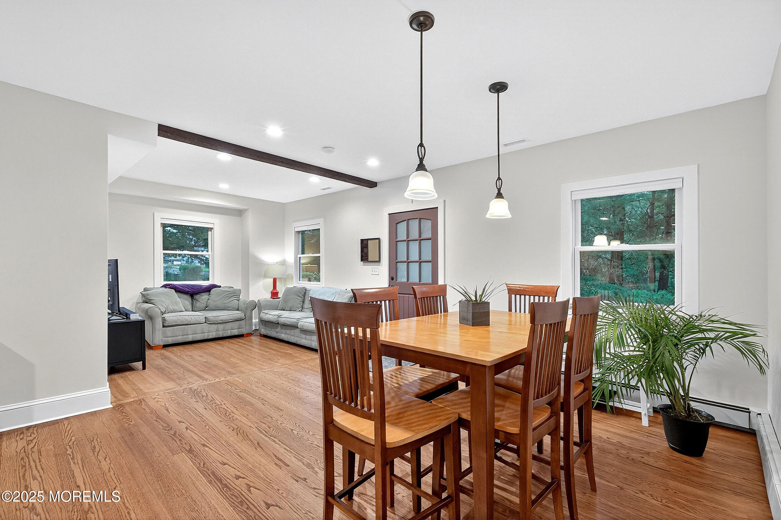 1961 Jumping Brook Road Tinton Falls, NJ 07753 - Photo 30 of 45 a view of a dining room with furniture window and wooden floor